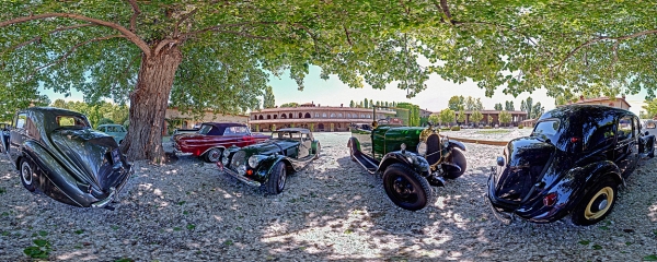 Vintage cars in the old court of Grazzano Visconti near Piacenza